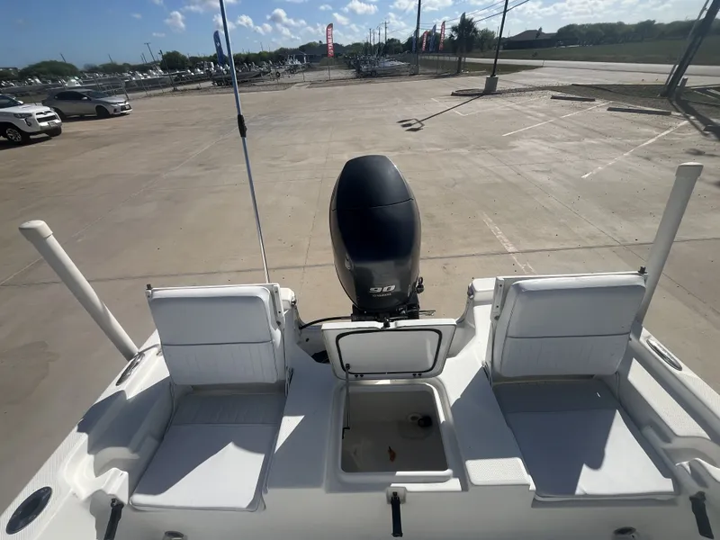Slide: The Image of Rear view of a 2013 Sea Fox 180XT boat with outboard motor. - 22