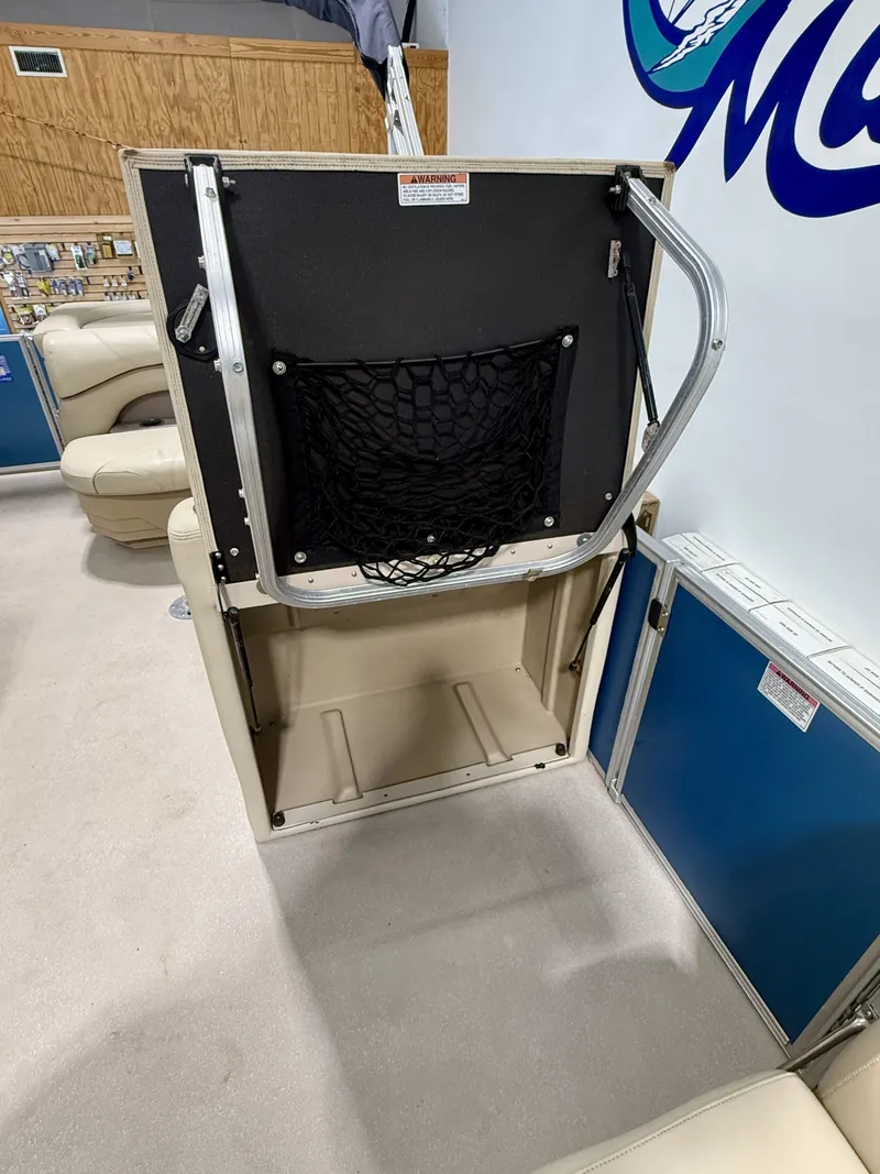 Slide: The Image of Interior of a 2017 Sylvan 8520 with foldable table and net. - 23