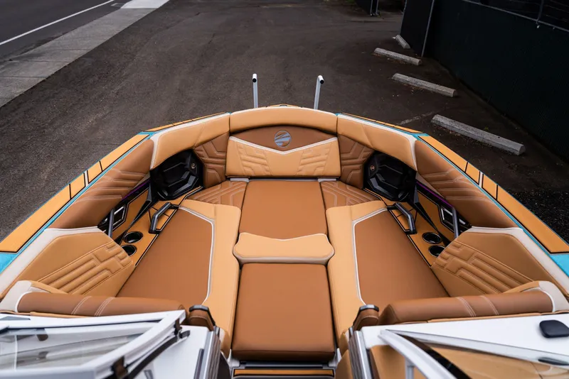 Slide: The Image of Interior of 2026 Tigé Ultré 25ZX boat with luxurious upholstery. - 19
