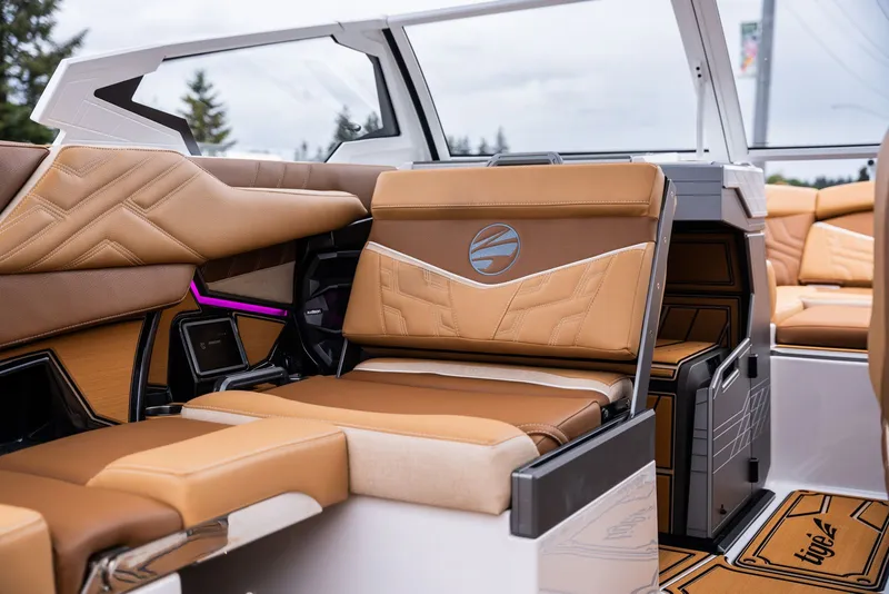 Slide: The Image of Interior of 2026 Tigé Ultré 25ZX with luxurious leather seating. - 22