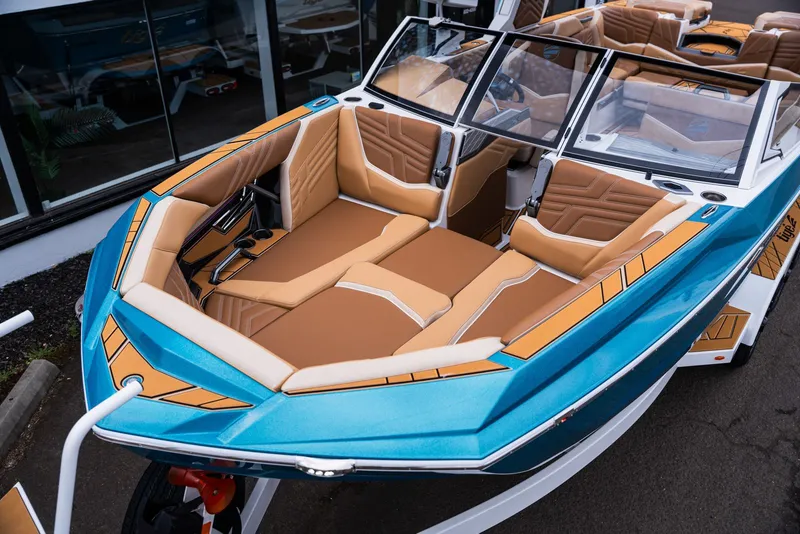 Slide: The Image of 2026 Tigé Ultré 25ZX boat with luxurious interior design. - 27