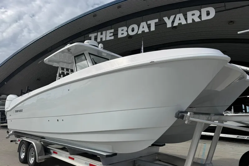 Slide: The Image of 2026 Twin Vee 280 GFX2 CC boat on trailer at The Boat Yard. - 17