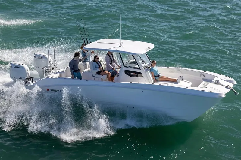 Slide: The Image of Manufacturer Provided Image: 2026 Twin Vee 280 GFX2 CC cruising on open water with passengers enjoying the ride. - 7