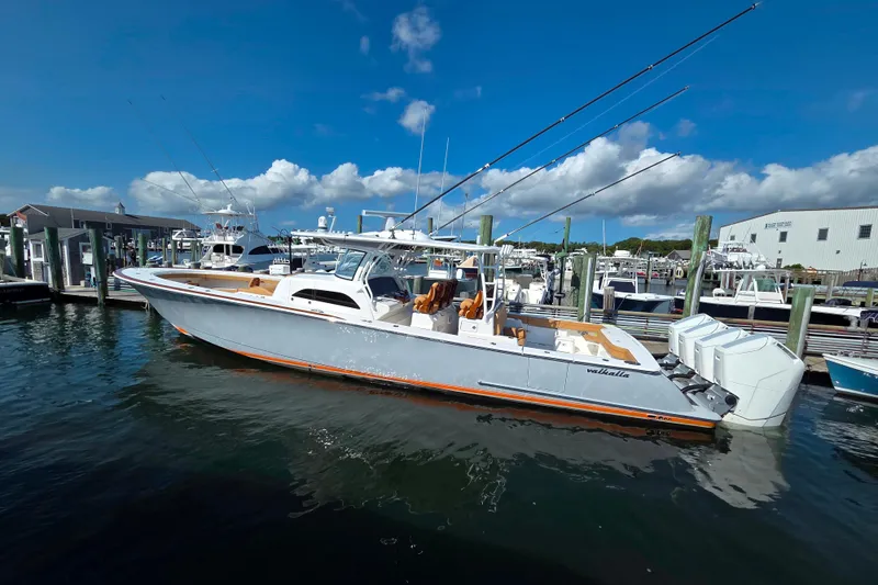 Slide: The Image of 2023 Valhalla Boatworks V-46 docked, featuring sleek design and powerful engines. - 15