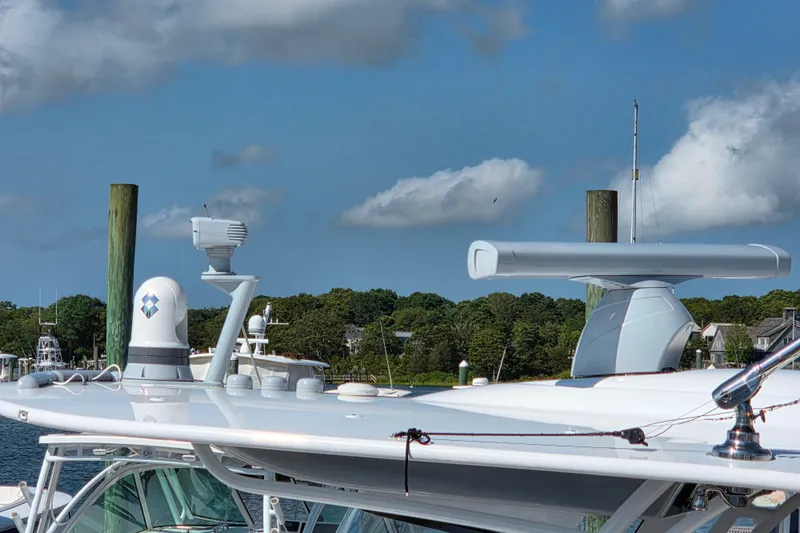 Slide: The Image of 2023 Valhalla Boatworks V-46 radar and navigation equipment under a clear blue sky. - 26