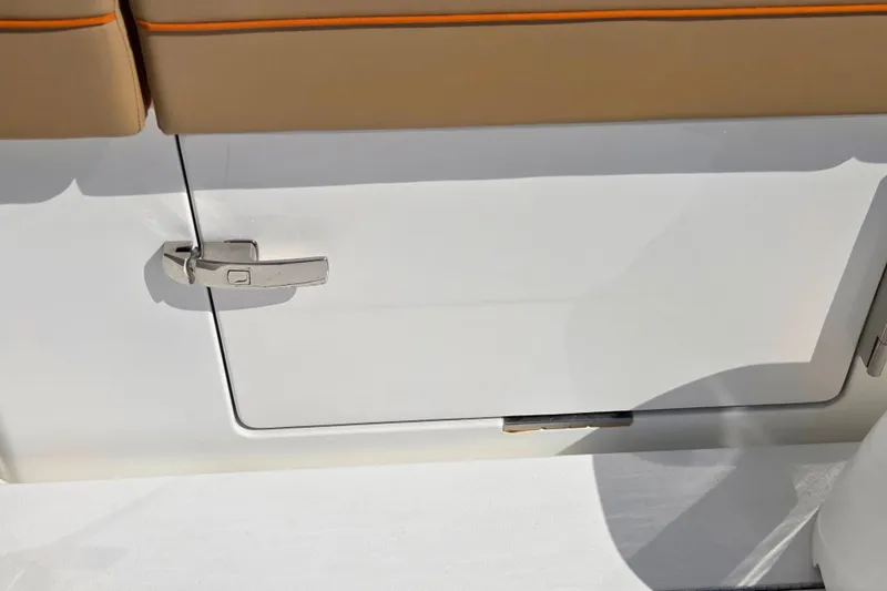 Slide: The Image of 2023 Valhalla Boatworks V-46 storage compartment with sleek handle design. - 36