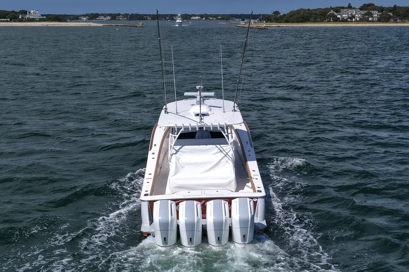 Slide: The Image of 2023 Valhalla Boatworks V-46 cruising on open water, rear view. - 7