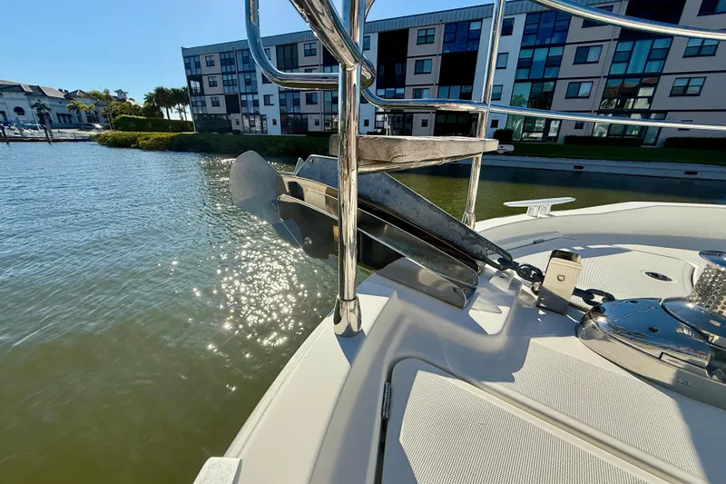 Slide: The Image of 2023 Beneteau Swift Trawler 48 anchor detail with waterfront view. - 22