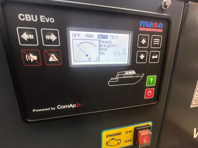 Slide: The Image of Control panel of a Mase generator on a 2023 Beneteau Swift Trawler 48. - 44