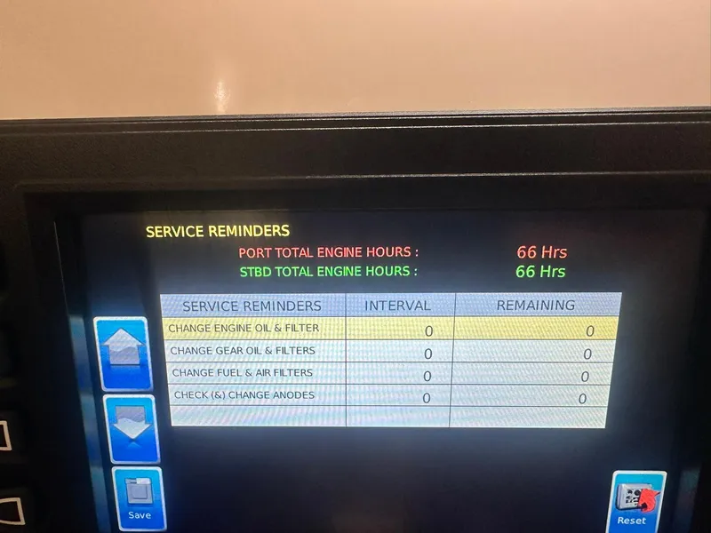 Slide: The Image of Display screen showing service reminders for Beneteau Swift Trawler 48, 2023 model, with engine hours. - 45