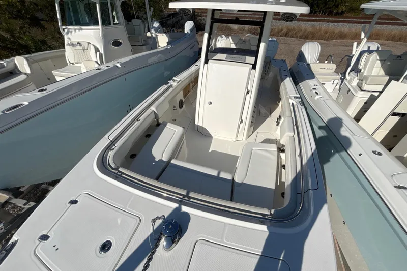 Slide: The Image of 2026 World Cat 265 CC-X boat with spacious deck and modern design. - 2