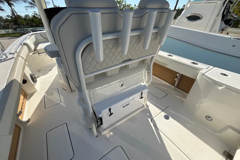 Slide: The Image of 2026 World Cat 265 CC-X boat interior with seating and storage compartments. - 9