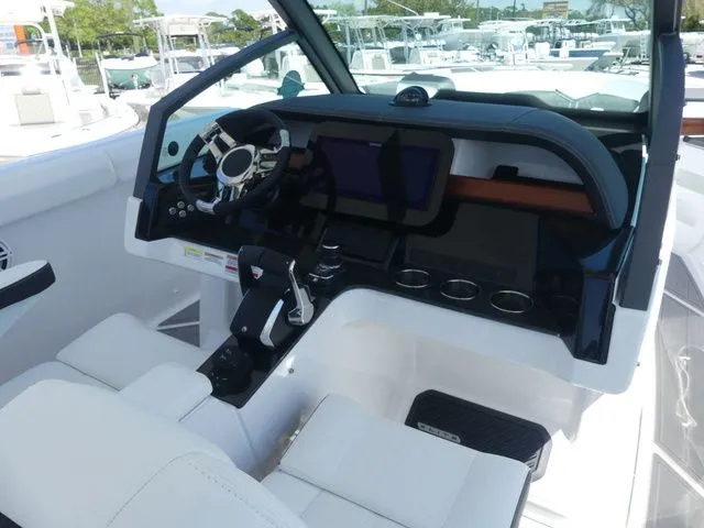 Slide: The Image of Interior view of 2026 Monterey Elite 30 OB boat cockpit. - 13
