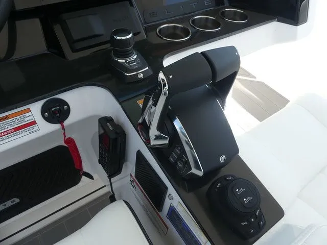 Slide: The Image of Cockpit of 2026 Monterey Elite 30 OB with throttle and controls. - 17