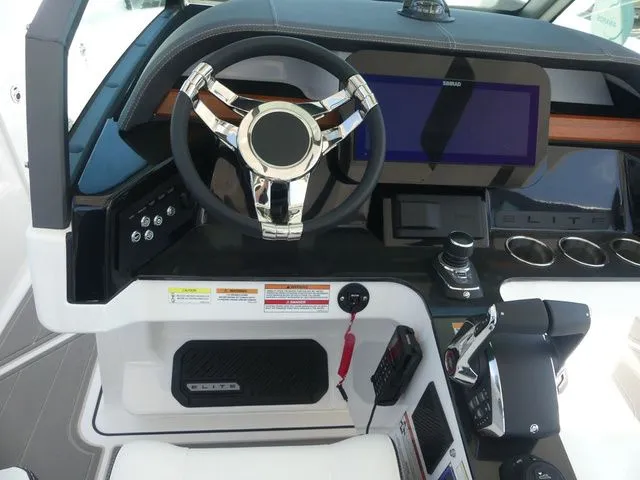 Slide: The Image of Cockpit of 2026 Monterey Elite 30 OB with modern steering and display. - 18