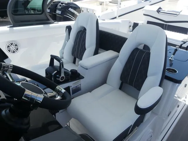 Slide: The Image of Interior of 2026 Monterey Elite 30 OB with luxurious seating. - 19