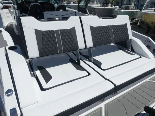 Slide: The Image of Luxurious seating in the 2026 Monterey Elite 30 OB boat. - 8