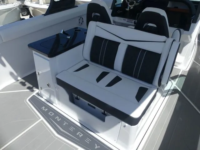 Slide: The Image of Interior of 2026 Monterey Elite 30 OB with luxurious seating. - 9