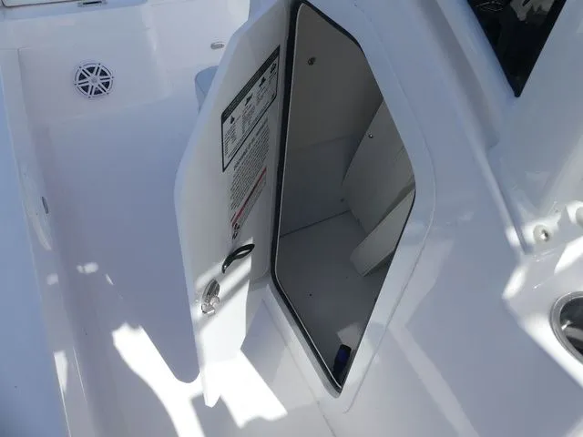 Slide: The Image of Storage compartment in 2026 Twin Vee 220 Baycat boat. - 24