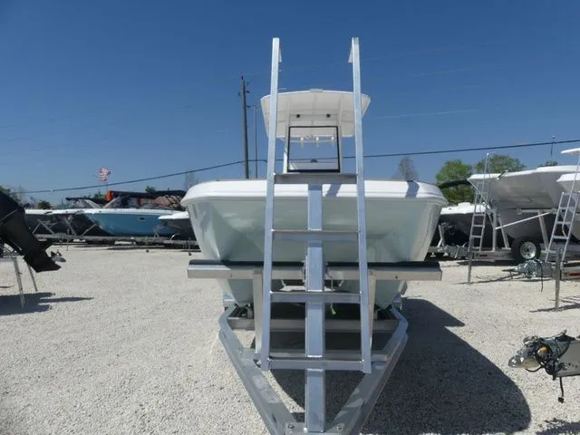 Slide: The Image of 2026 Twin Vee 220 Baycat boat on trailer, front view. - 3
