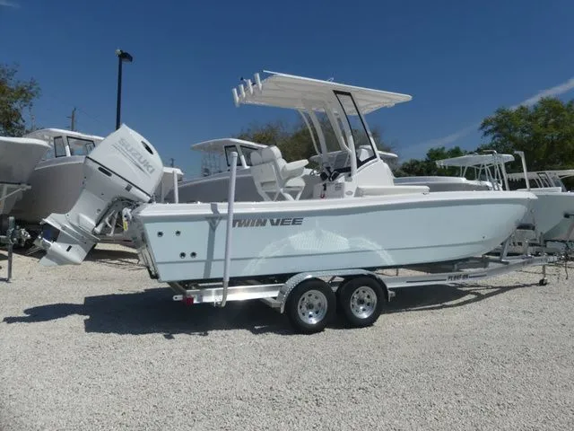 Slide: The Image of 2026 Twin Vee 220 Baycat on trailer, side view. - 6