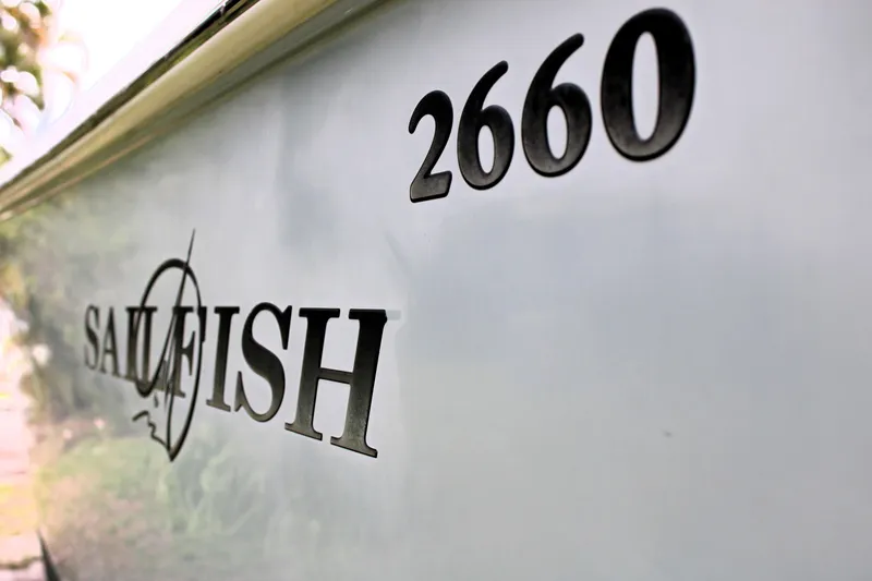 Slide: The Image of 2008 Sailfish 2660 CC boat model name and number on hull. - 1