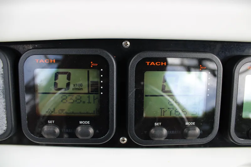 Slide: The Image of Close-up of 2008 Sailfish 2660 CC tachometer displays with digital readings. - 21