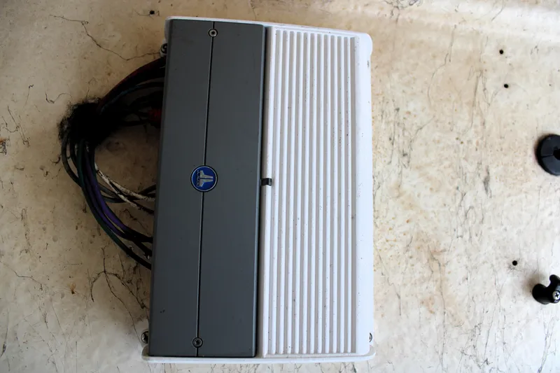 Slide: The Image of Marine amplifier with wiring on a 2008 Sailfish 2660 CC boat. - 30