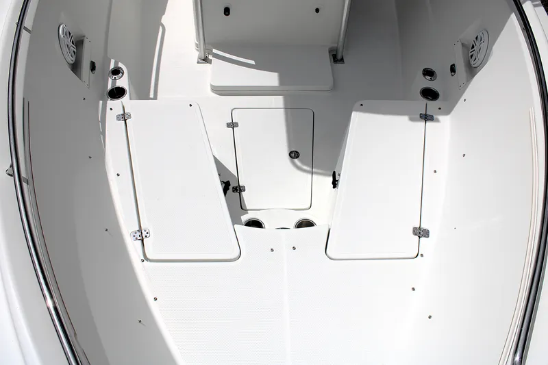 Slide: The Image of Interior view of a 2008 Sailfish 2660 CC boat, showcasing storage compartments and seating area. - 34