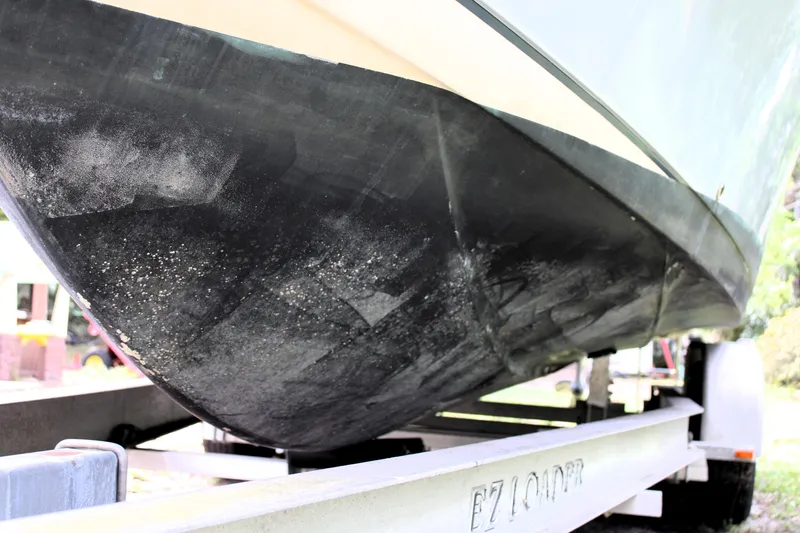 Slide: The Image of 2008 Sailfish 2660 CC boat hull on trailer, close-up view. - 5