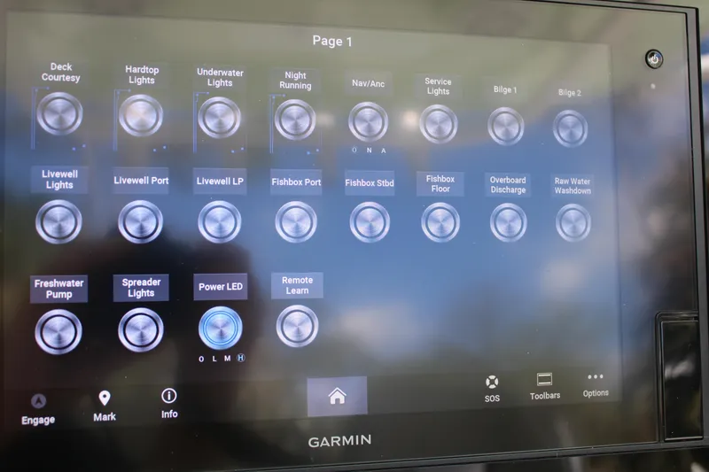 Slide: The Image of Touchscreen control panel on a 2021 Sportsman Open 282 Center Console boat. - 11