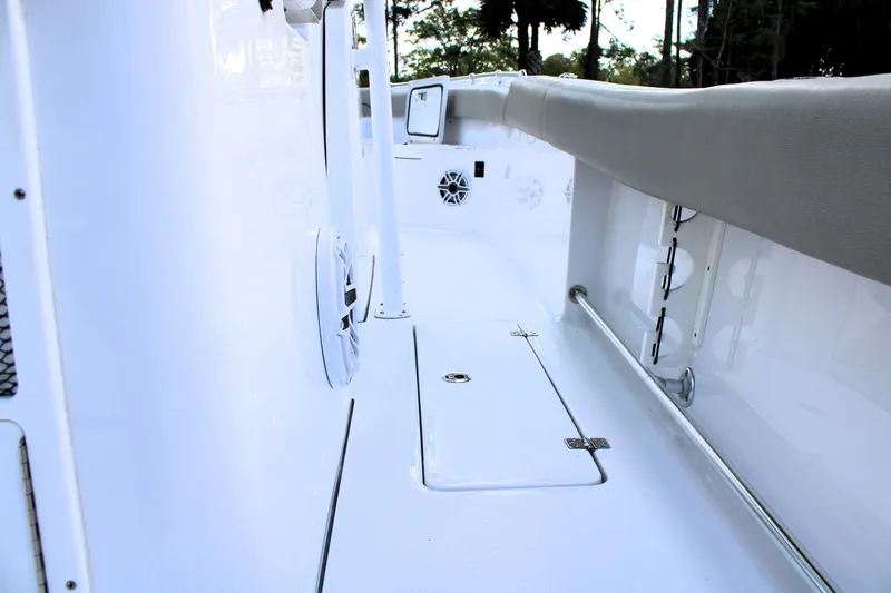Slide: The Image of 2021 Sportsman Open 282 Center Console interior with sleek white design and modern features. - 27