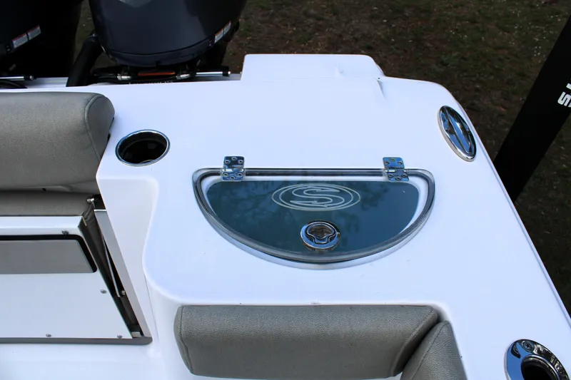 Slide: The Image of 2021 Sportsman Open 282 Center Console boat with seating and storage compartment. - 33