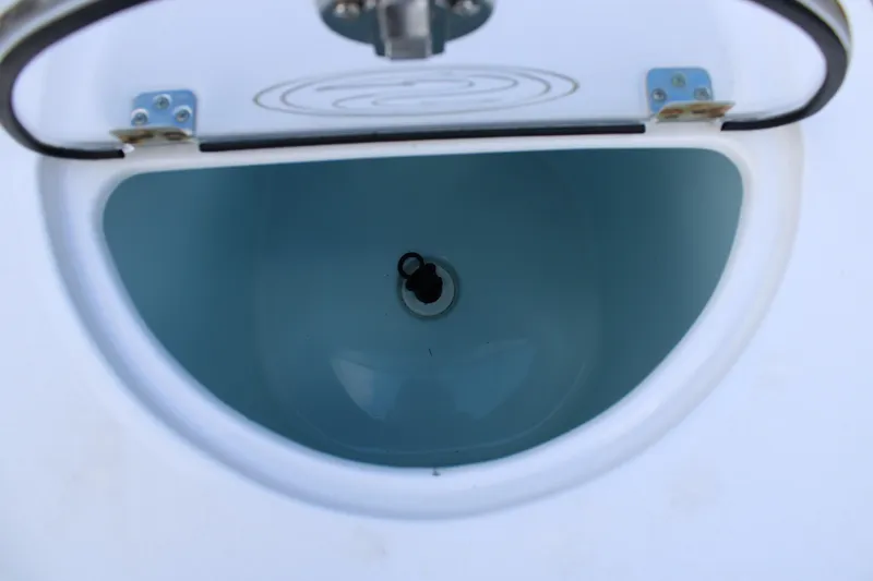 Slide: The Image of Livewell compartment on a 2021 Sportsman Open 282 Center Console boat. - 34