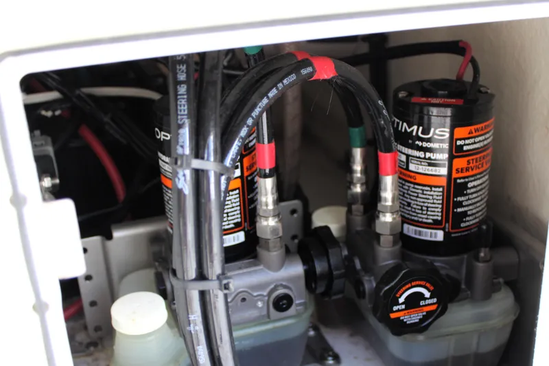 Slide: The Image of 2021 Sportsman Open 282 Center Console hydraulic steering system components. - 43