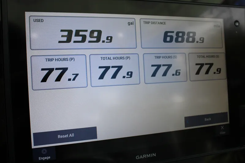 Slide: The Image of Display screen showing fuel usage and trip data for 2021 Sportsman Open 282 Center Console. - 46