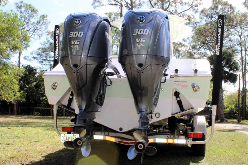 Slide: The Image of 2021 Sportsman Open 282 Center Console with twin Yamaha 300 V6 engines. - 5