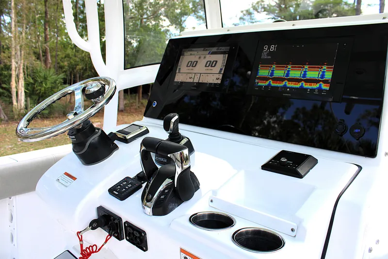 Slide: The Image of 2021 Sportsman Open 282 Center Console dashboard with advanced navigation displays. - 9