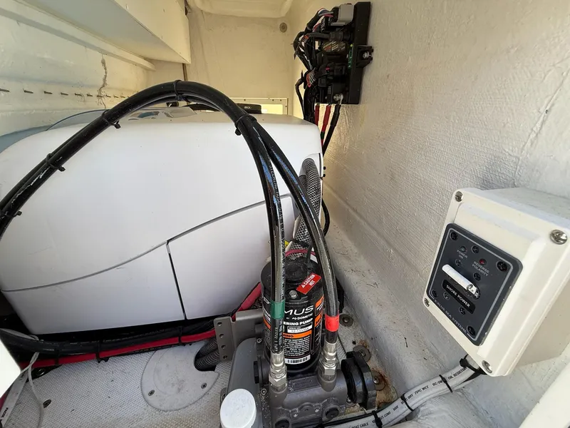 Slide: The Image of 2023 SeaHunter 28 Floridian boat interior showing electrical and mechanical components. - 33