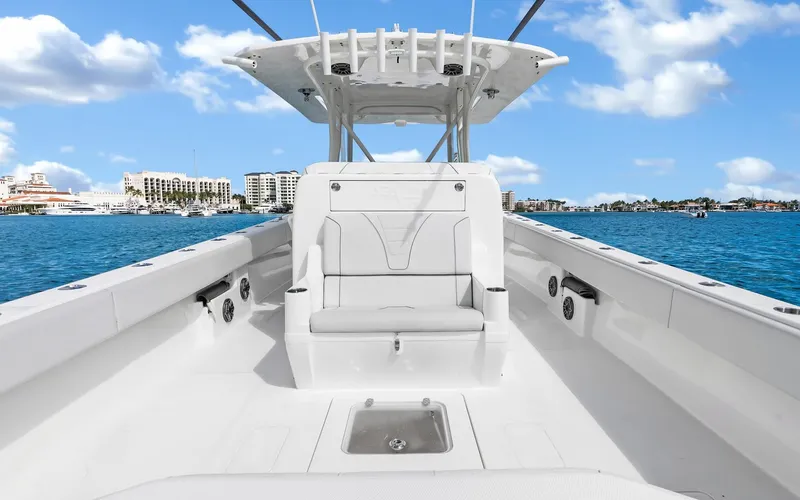 Slide: The Image of 2019 SeaVee 390Z boat interior with seating, ocean view, and blue sky. - 29