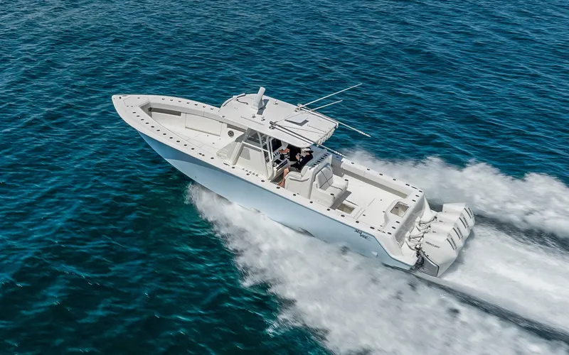 Slide: The Image of 2019 SeaVee 390Z boat cruising on open blue water. - 3