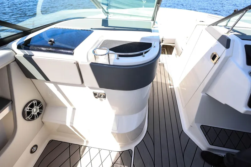 Slide: The Image of 2023 Sea Ray SLX 310 Outboard boat interior with sleek design and modern amenities. - 20