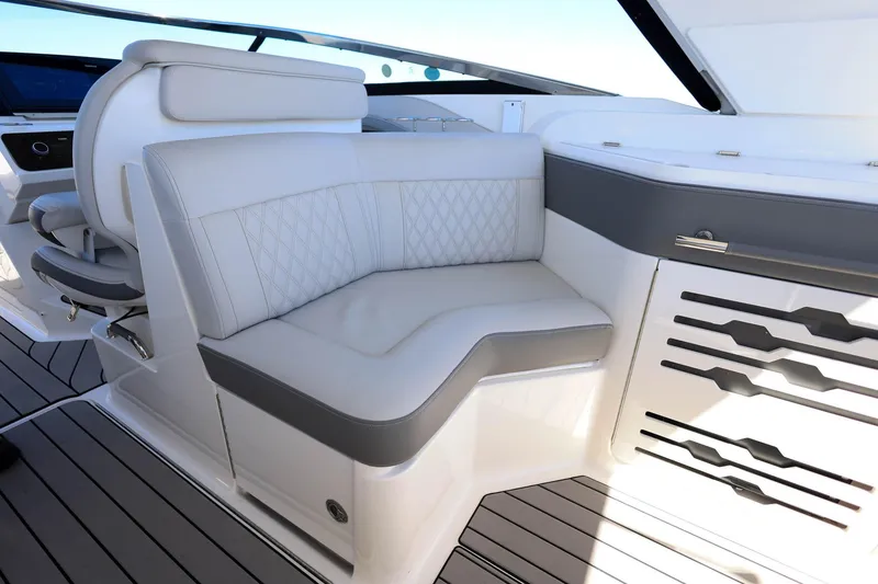Slide: The Image of Luxurious seating on 2023 Sea Ray SLX 310 Outboard boat, featuring elegant design and comfort. - 23