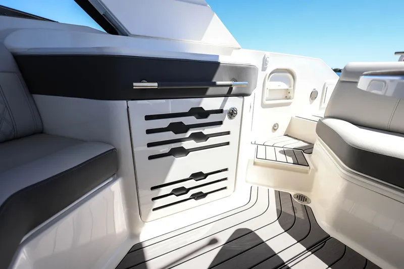 Slide: The Image of 2023 Sea Ray SLX 310 Outboard interior with sleek seating and modern design. - 26