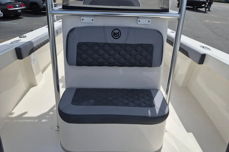 Slide: The Image of 2026 May-Craft 245 Offshore CC boat seating with hexagonal pattern design. - 13