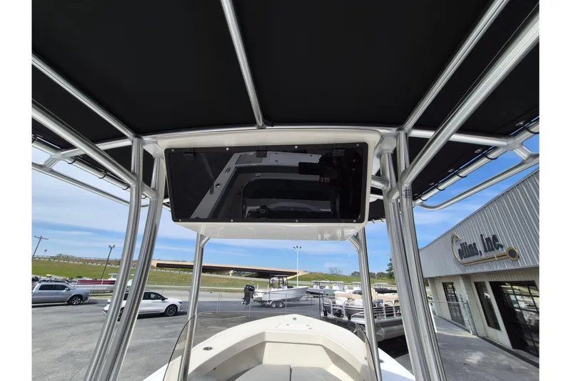 Slide: The Image of 2026 May-Craft 245 Offshore CC boat with T-top and electronics enclosure. - 14