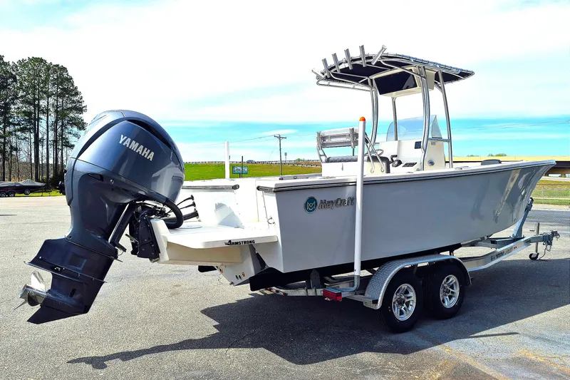 Slide: The Image of 2026 May-Craft 245 Offshore CC boat on trailer with Yamaha outboard motor. - 6