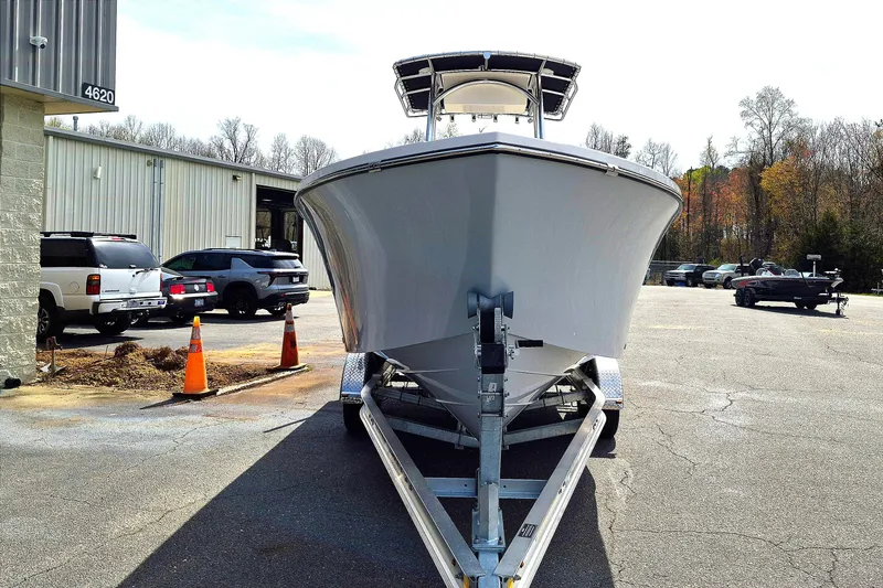 Slide: The Image of 2026 May-Craft 245 Offshore CC boat on trailer in parking lot. - 9