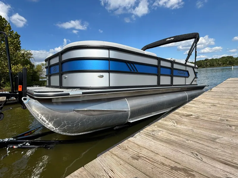Slide: The Image of 2027 Bentley Pontoons 223 Bolt at dock, blue sky. - 38