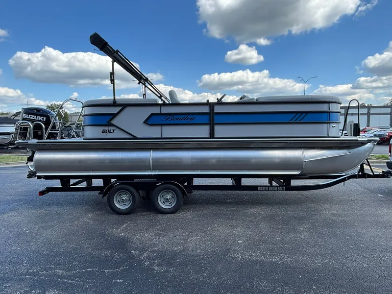 Slide: The Image of 2027 Bentley Pontoons 223 Bolt on trailer, blue sky. - 4